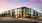 Modern apartment complex in Natomas with sleek, contemporary design and spacious balconies, set against a picturesque sunset sky.
