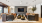 Elegant living room with modern furnishings, featuring plush sofas, stylish pendant lights, and contemporary wall art for a luxurious atmosphere at Ona in Natomas