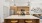 Contemporary kitchen with elegant wooden cabinetry, modern appliances, and a sleek island counter with pendant lighting, opening into a stylishly decorated living area at Ona Natomas in Sacramento