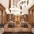 a living room with a chandelier and couches