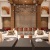 a living room with a large wood paneled wall